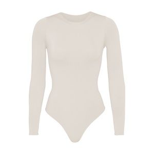 Skims ESSENTIAL CREW NECK LONG SLEEVE BODYSUIT | BONE